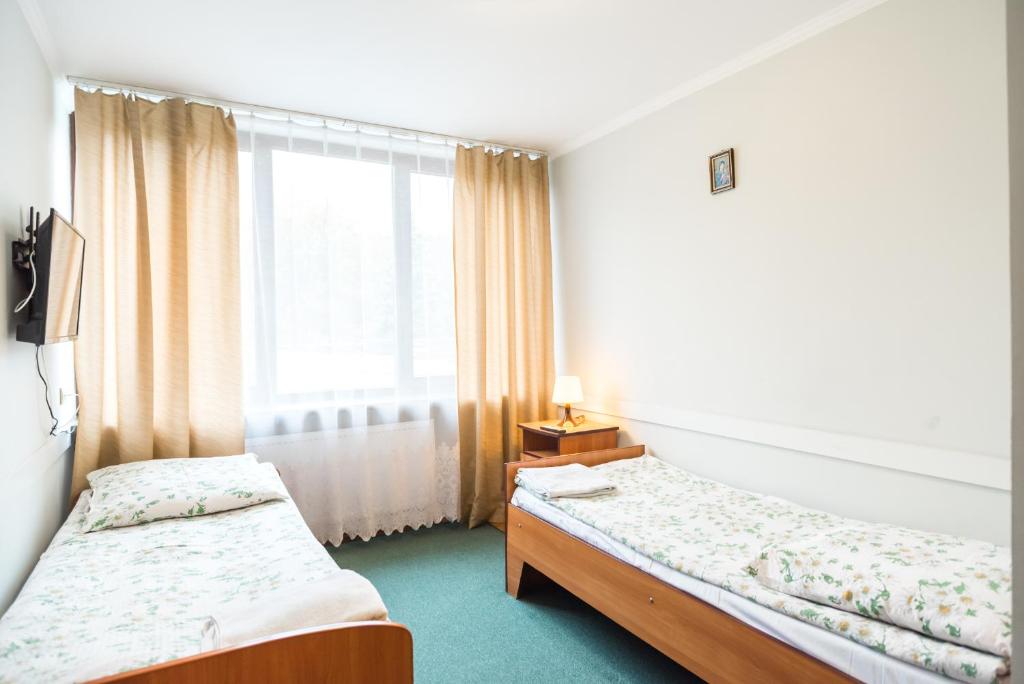 Двухместный (Двухместный номер с 2 отдельными кроватями) парк-отеля Dobre Miejsce Варшава