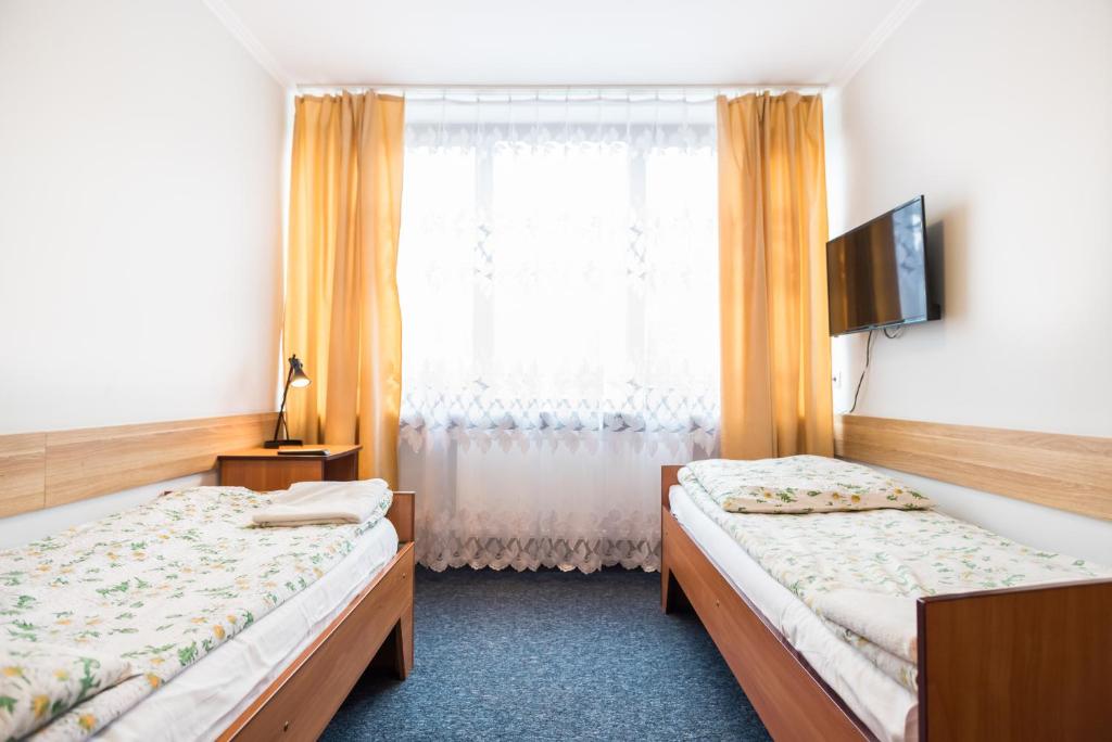 Двухместный (Двухместный номер с 2 отдельными кроватями) парк-отеля Dobre Miejsce Варшава