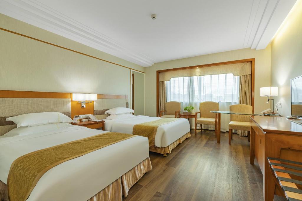 Двухместный (Стандартный двухместный номер с 2 отдельными кроватями) отеля Oscar Hotel, Хайкоу