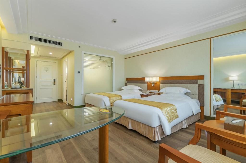 Двухместный (Улучшенный двухместный номер с 2 отдельными кроватями) отеля Oscar Hotel, Хайкоу