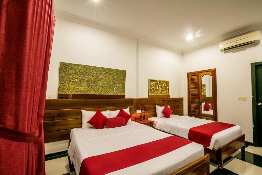 Двухместный (Двухместный номер Делюкс с 2 отдельными кроватями и террасой) отеля Asanak D'Angkor Boutique Hotel, Сием Рип