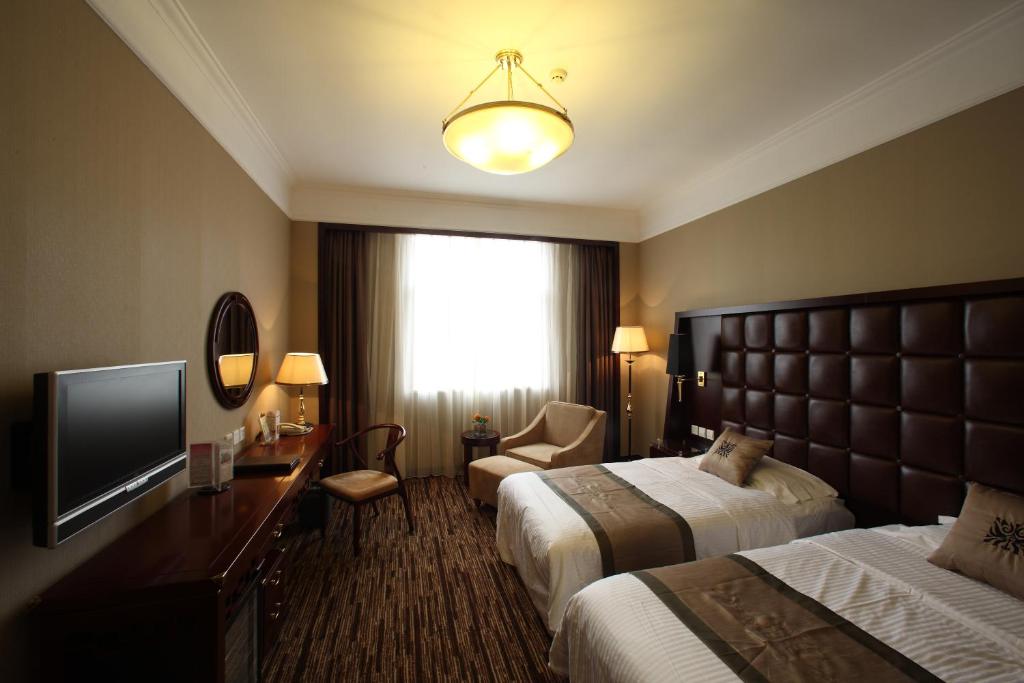 Двухместный (Двухместный номер бизнес-класса с 2 отдельными кроватями) отеля Jianguo Qianmen Beijing, Пекин