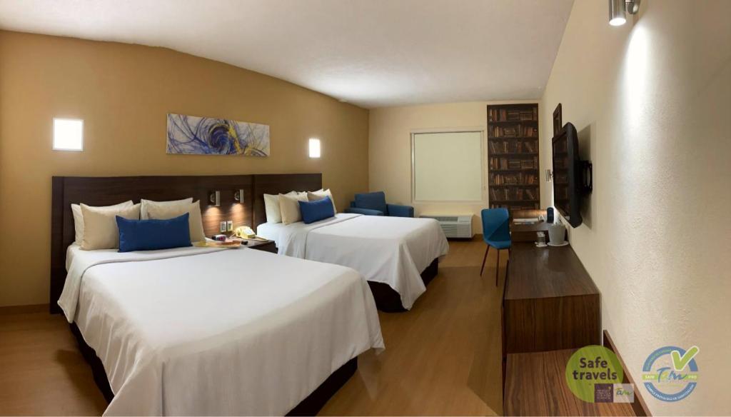 Четырехместный (Четырехместный номер) отеля Rio Vista Inn Business High Class Tampico, Тампико