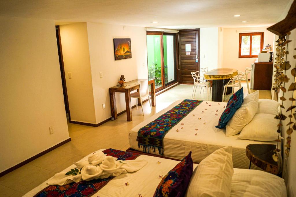 Сьюит (Четырехместные апартаменты) апарт-отеля Casa Azul Maya, Исла-Мухерес