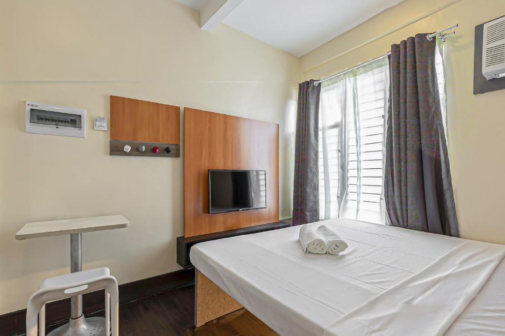 Двухместный (Номер Делюкс с кроватью размера «king-size») апарт-отеля ZEN Rooms Selah Lofts Pasay, Манила