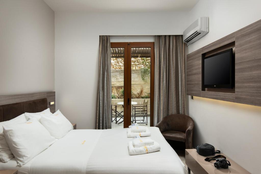 Двухместный (Стандартный двухместный номер с 1 кроватью и балконом) отеля Royal Sun, Ханья