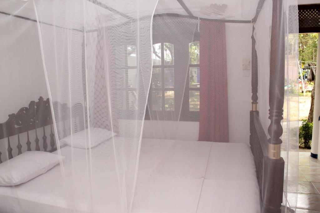Двухместный (Стандартный двухместный номер с 1 кроватью или 2 отдельными кроватями и видом на море - Наблюдение за китами) курортного отеля Jagabay Resort & Restaurant, Велигама