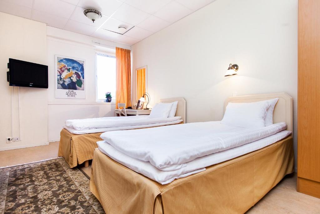 Двухместный (Двухместный номер с 1 кроватью или 2 отдельными кроватями) отеля Hotel Älvsjö, Стокгольм