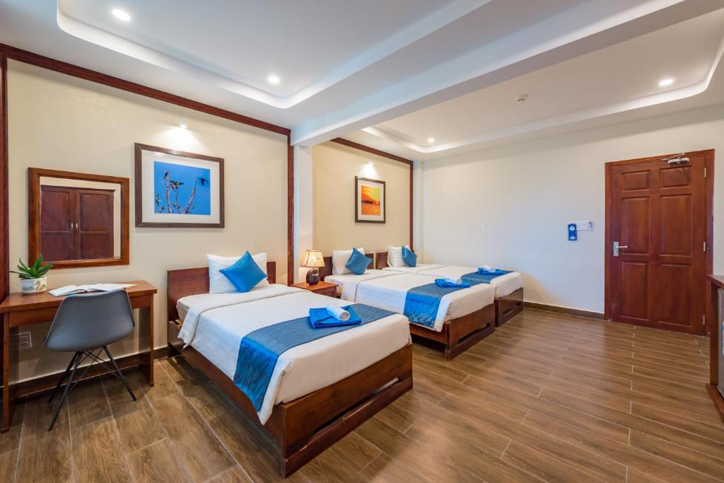 Трехместный (Улучшенный трехместный номер) отеля Brenta Phu Quoc Hotel, Дуонг-Донг