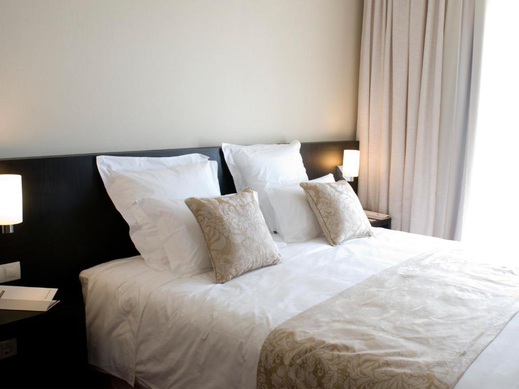 Двухместный (Представительский двухместный номер с 1 кроватью или 2 отдельными кроватями) отеля Lutecia Smart Design Hotel, Лиссабон