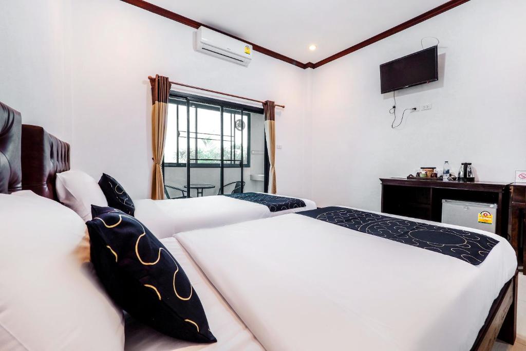 Двухместный (Улучшенный двухместный номер с 2 отдельными кроватями) отеля Be One Resort, Чианграй