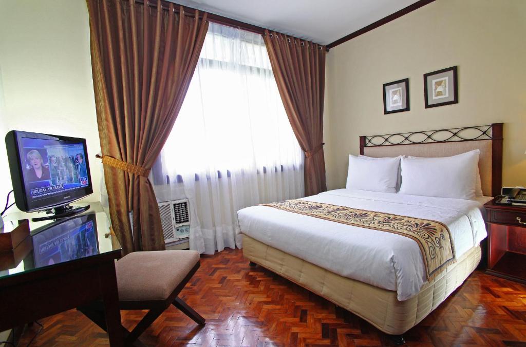 Сьюит (Представительский номер с 1 спальней) отеля Parque España Residence Hotel Managed by HII, Манила