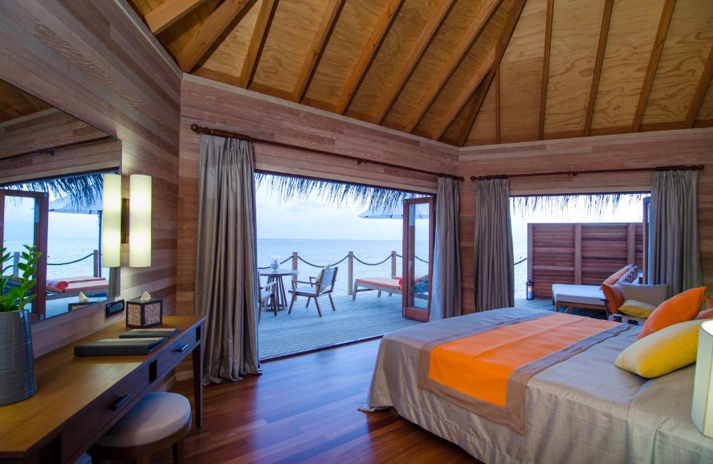 Сьюит (Суперлюкс с видом на море) курортного отеля Mirihi Island Resort, Мирихи