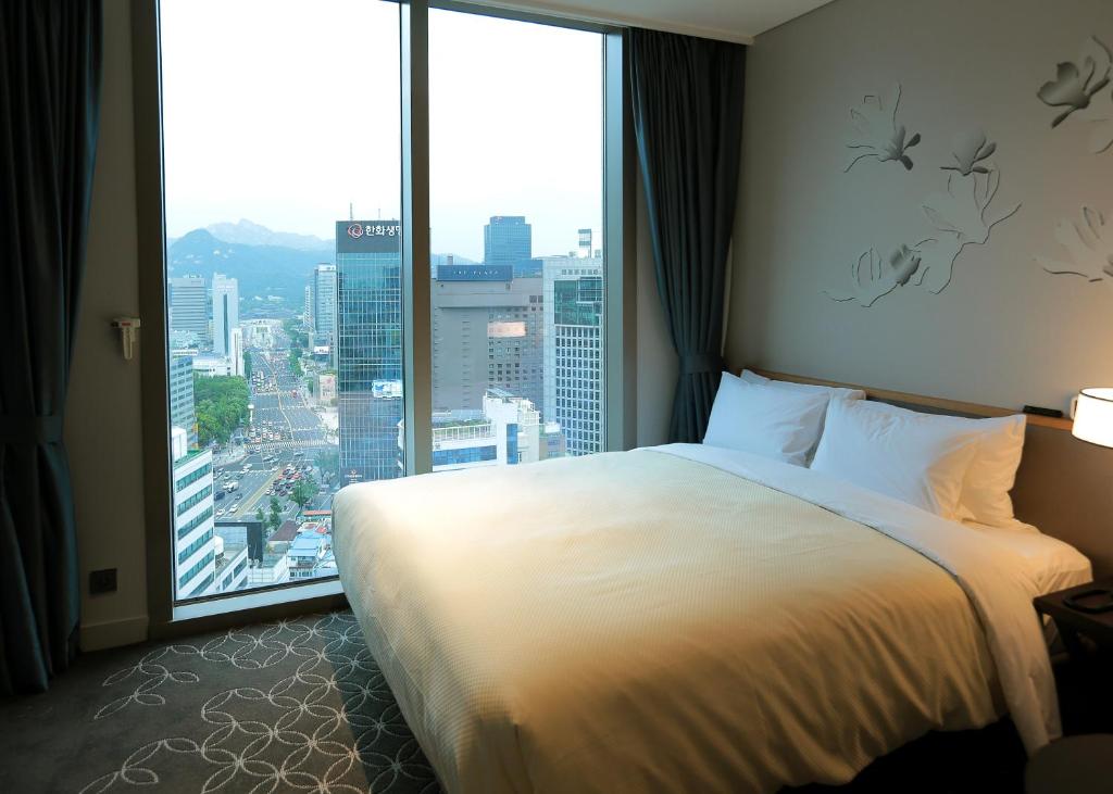 Двухместный (Улучшенный двухместный номер с 1 кроватью - 18-21 этажи) отеля Hotel Gracery Seoul, Сеул