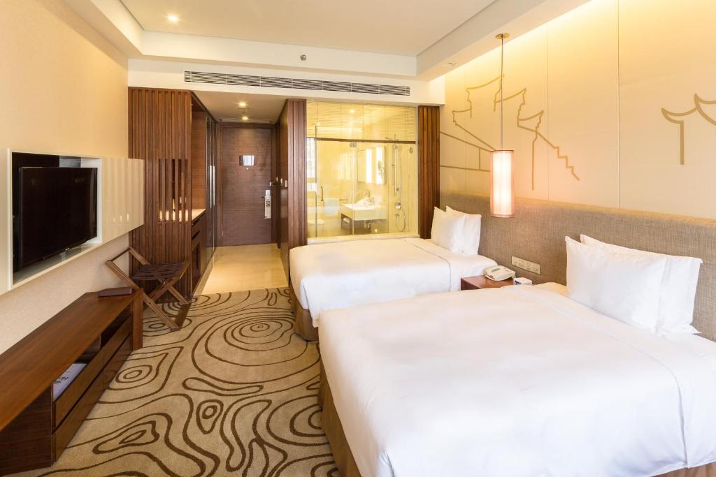 Двухместный (Двухместный номер Делюкс с 1 кроватью) отеля Holiday Inn Shanghai Hongqiao, Шанхай