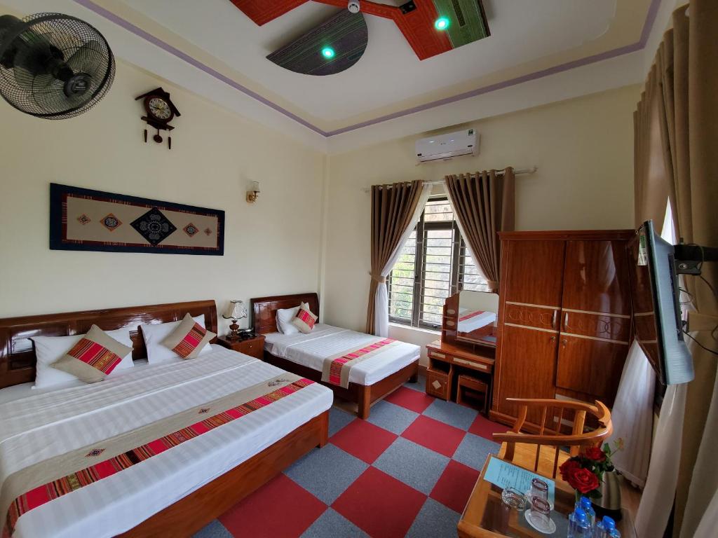 Двухместный (Двухместный номер Делюкс с 1 кроватью и дополнительной кроватью) отеля Trung Kiên Hotel, Шонла