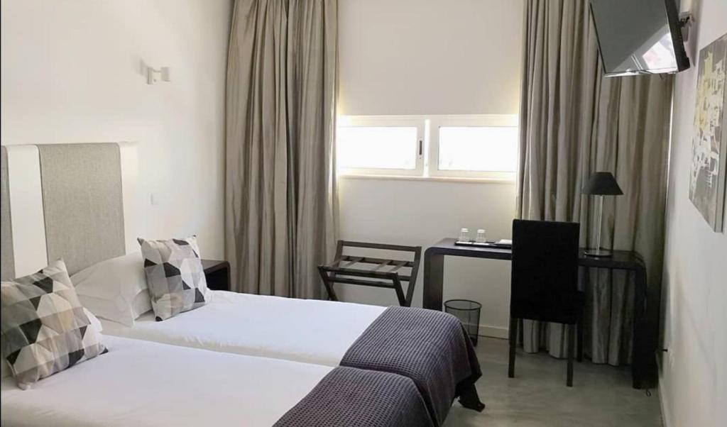 Двухместный (Двухместный номер эконом-класса с 2 отдельными кроватями) отеля Hotel Solar Dos Mascarenhas, Эшпинью