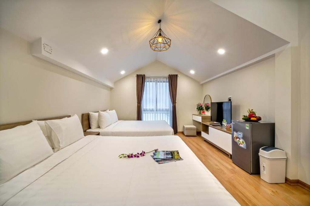 Четырехместный (Классический четырехместный номер) апарт-отеля Little An Bang Villa, Хойан