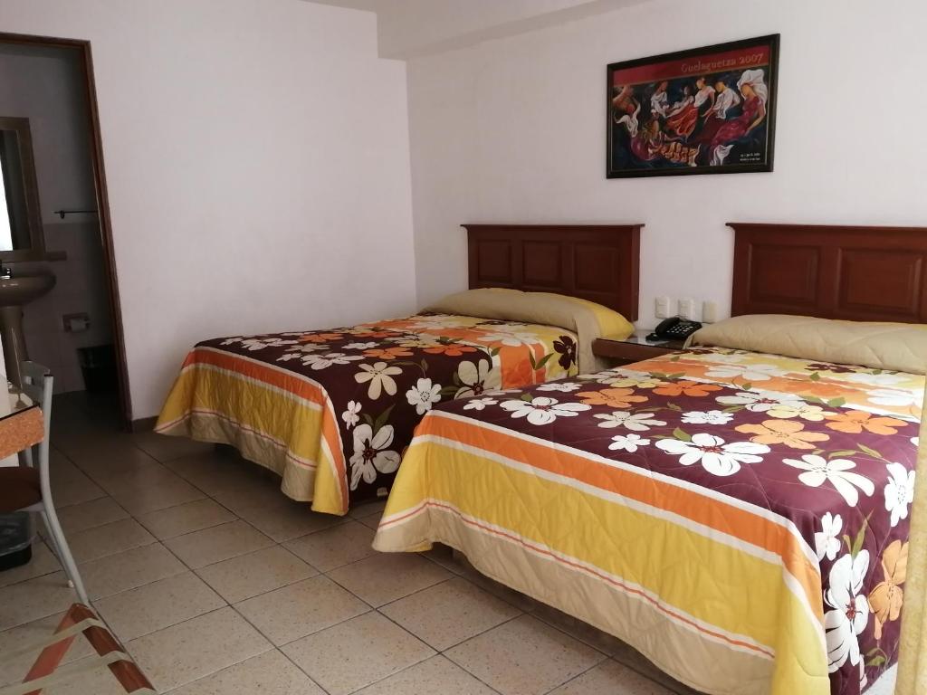 Двухместный (Двухместный номер с 2 двуспальными кроватями) отеля Hotel Camba, Оахака-де-Хуарес