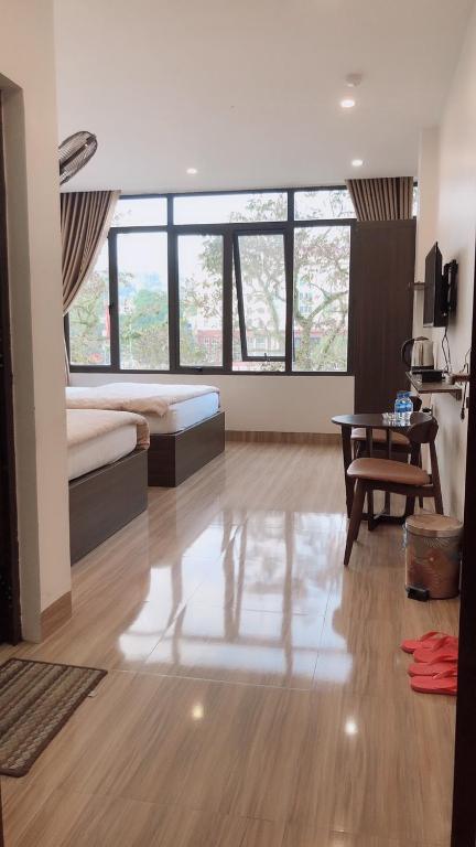 Двухместный (Двухместный номер с 2 отдельными кроватями и окном) отеля Khách Sạn Nhật Bảo(Nhật Bảo Hotel) - Hà Giang, Хазянг