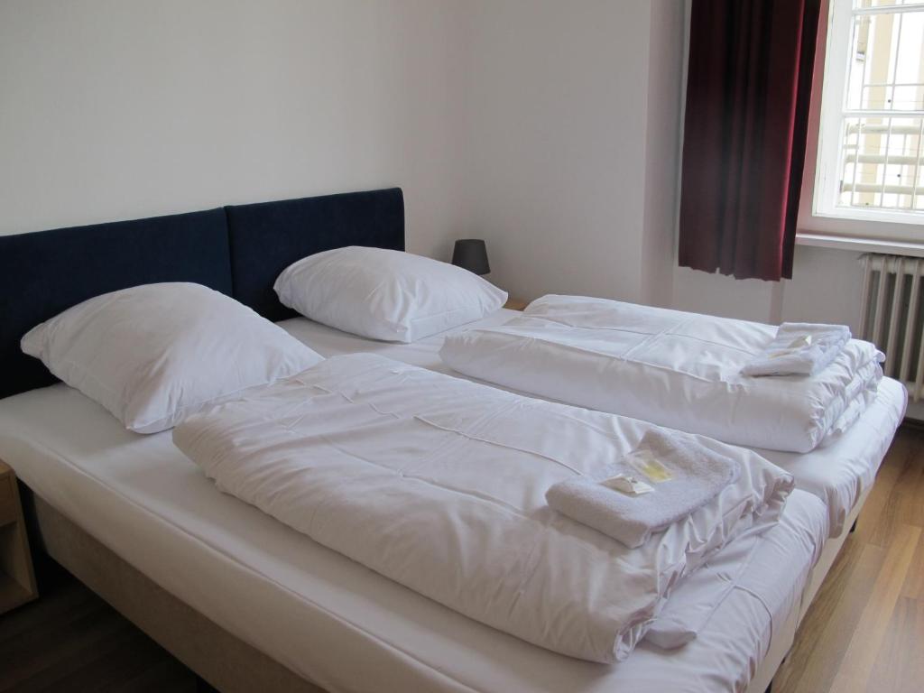 Двухместный (Двухместный номер с 2 отдельными кроватями) хостела Metropol Hostel Berlin, Берлин