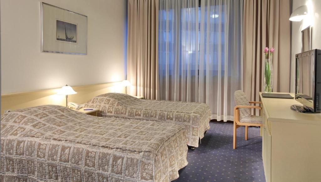 Двухместный (Двухместный номер с 2 отдельными кроватями) отеля Hotel Slavija Garni, Белград