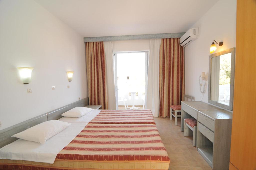 Двухместный (Двухместный номер с 2 отдельными кроватями) отеля Fourtounis Hotel, Кефалос
