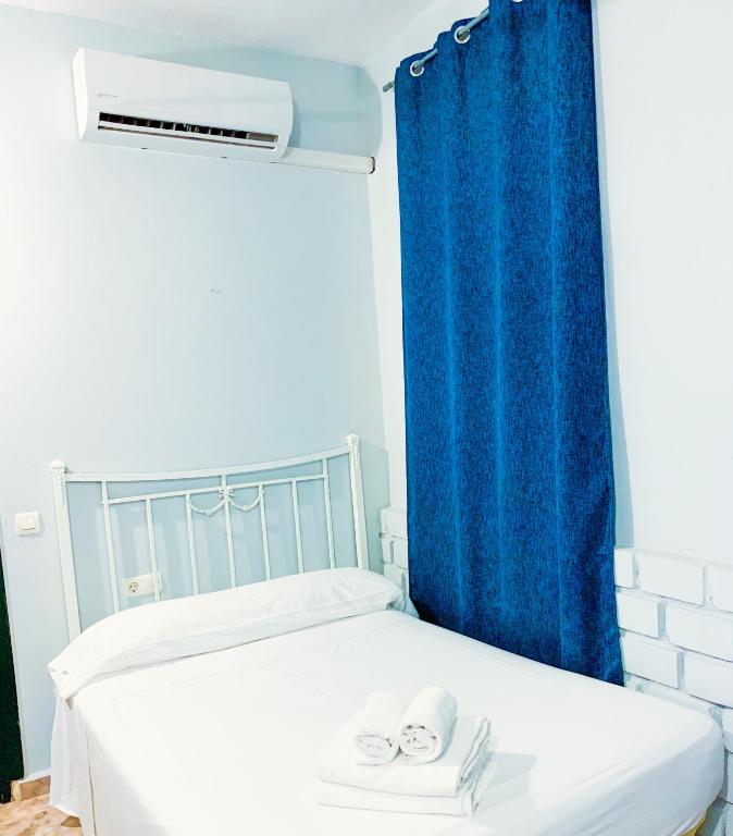 Двухместный (Двухместный номер с 1 кроватью или 2 отдельными кроватями и собственной ванной комнатой) гостевого дома El Castillo, Севилья