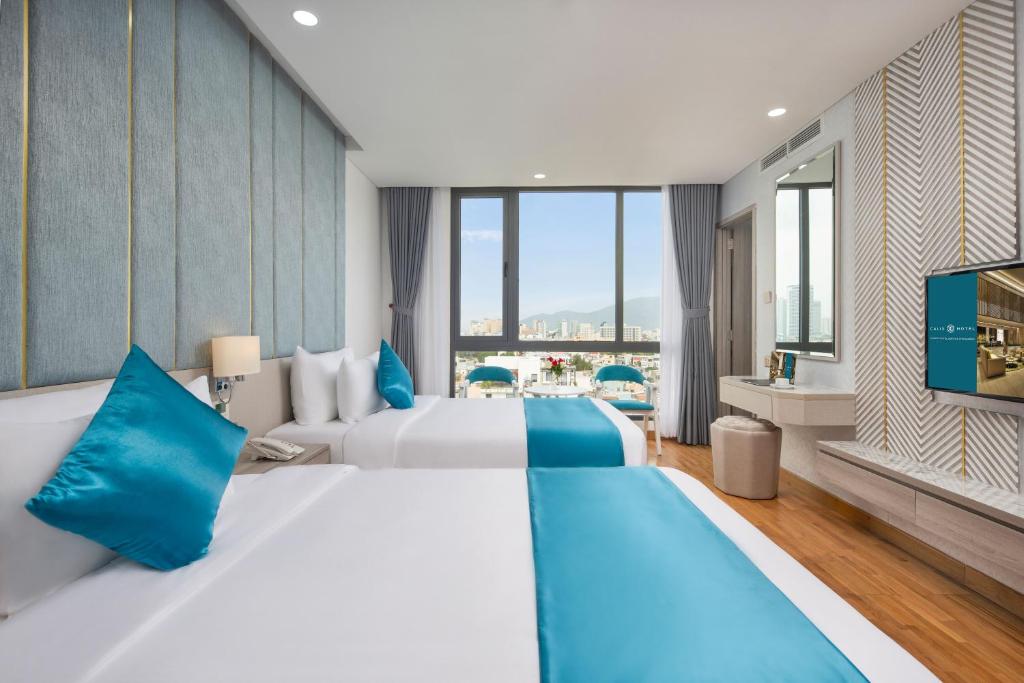 Двухместный (Улучшенный двухместный номер с 2 отдельными кроватями) отеля Calix Hotel, Дананг