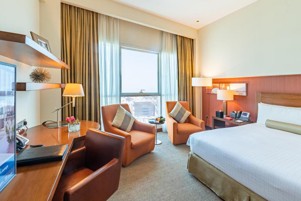 Двухместный (Двухместный клубный номер с 2 отдельными кроватями, бесплатное посещение лаунджа) отеля Grand Millennium Al Wahda Abu Dhabi, Абу-Даби