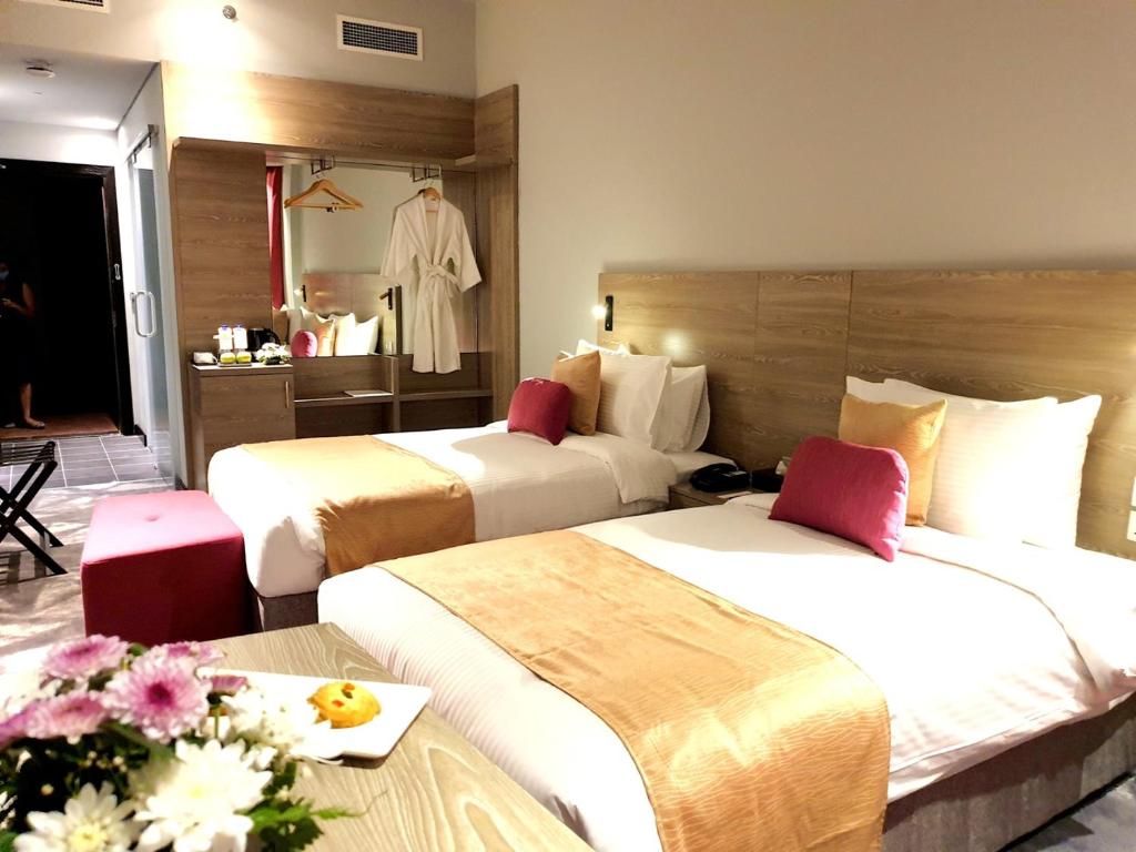 Двухместный (Двухместный номер Делюкс с 1 кроватью или 2 отдельными кроватями) отеля FORTUNE ATRIUM HOTEL, Дубай