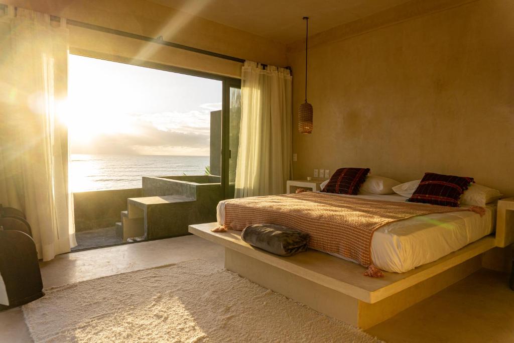 Сьюит (Главный номер Делюкс с кроватью размера «king-size», мини-бассейном и террасой, рядом с океаном) отеля Posada del Sol Tulum, Тулум