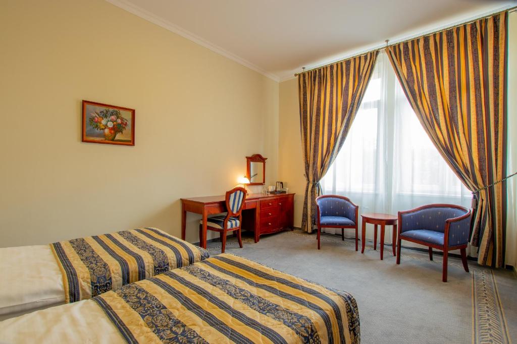Двухместный (Улучшенный двухместный номер с 1 кроватью или 2 отдельными кроватями) отеля Giovanni Giacomo, Теплице