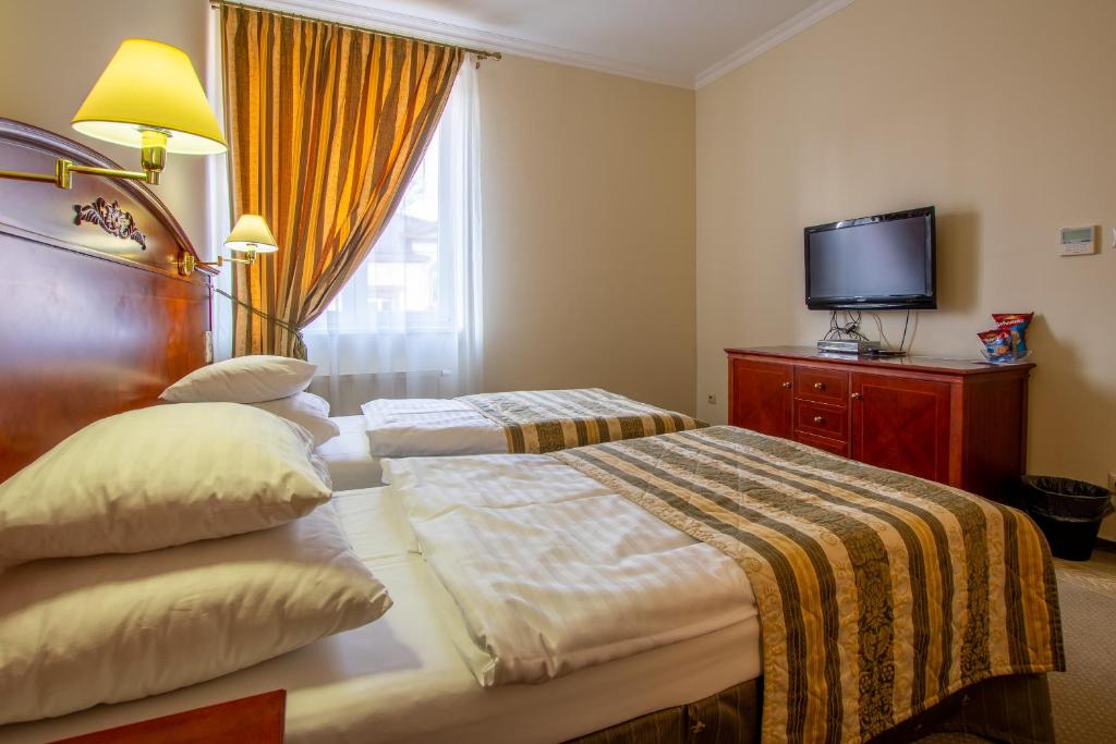 Двухместный (Стандартный двухместный номер с 2 отдельными кроватями) отеля Giovanni Giacomo, Теплице