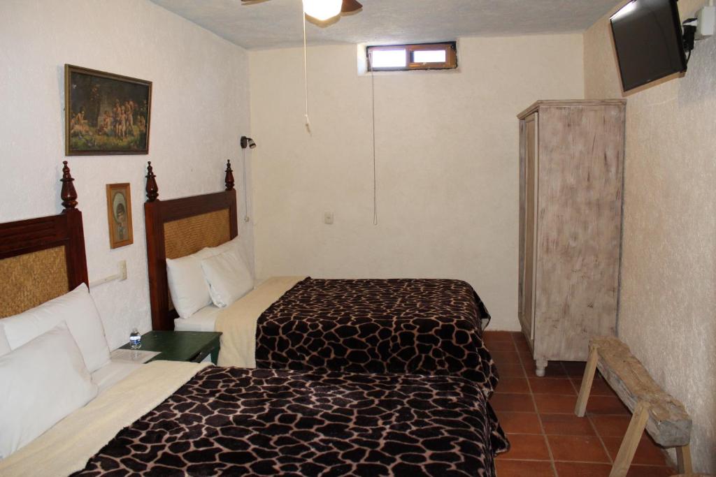 Двухместный (Небольшой двухместный номер с 2 отдельными кроватями) отеля Casa 19 de Enero, Берналь