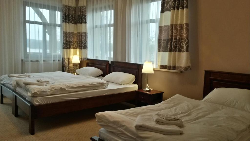 Двухместный (Двухместный номер Делюкс с 2 отдельными кроватями) курортного отеля Gościniec Molo, Мронгово