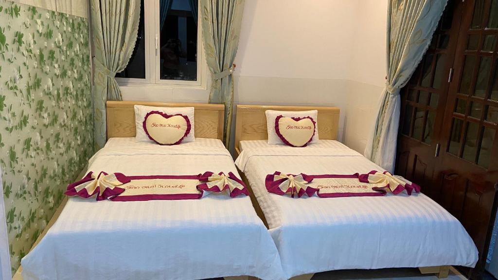 Двухместный (Двухместный номер с 2 отдельными кроватями и балконом) отеля Sao Mai hotel, Кондао
