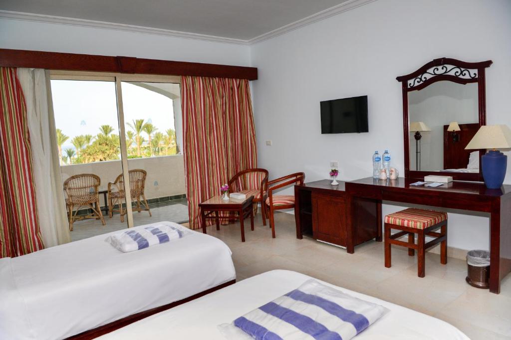Двухместный (Двухместный номер Делюкс с 1 кроватью или 2 отдельными кроватями) курортного отеля Brayka Bay Reef Resort, Абу-Дабаб