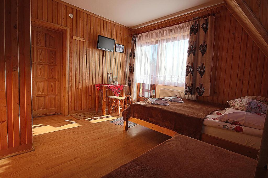 Трехместный (Трехместный номер с видом на горы) отеля Leśne Zacisze, Мужасихле