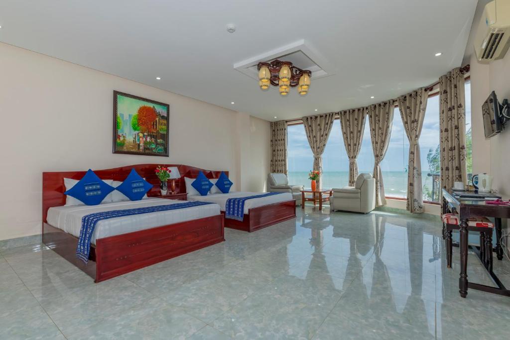 Сьюит (Суперлюкс с видом на море) курортного отеля Palmira Beach Resort & Spa, Фантхьет