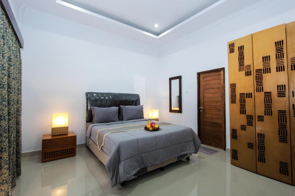 Двухместный (Улучшенный номер с кроватью размера «queen-size») гостевого дома Balilodgestay Murna's Guesthouse, Улувату