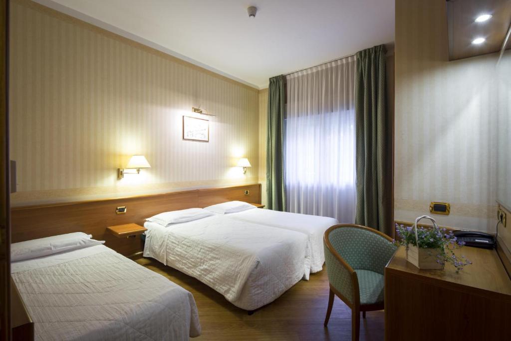 Трехместный (Трехместный номер) отеля Nuovo Hotel Del Porto, Болонья