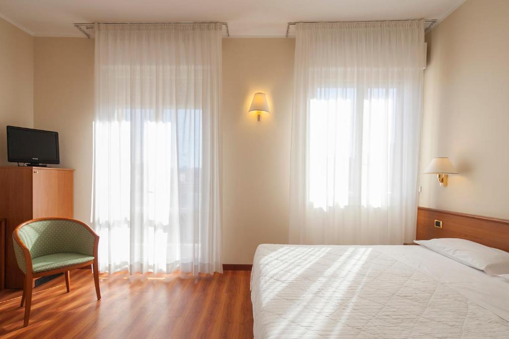 Двухместный (Двухместный номер с 1 кроватью или 2 отдельными кроватями) отеля Nuovo Hotel Del Porto, Болонья
