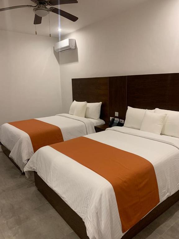 Двухместный (Двухместный люкс с 1 кроватью) отеля We Hotel Puerto Morelos, Пуэрто-Морелос