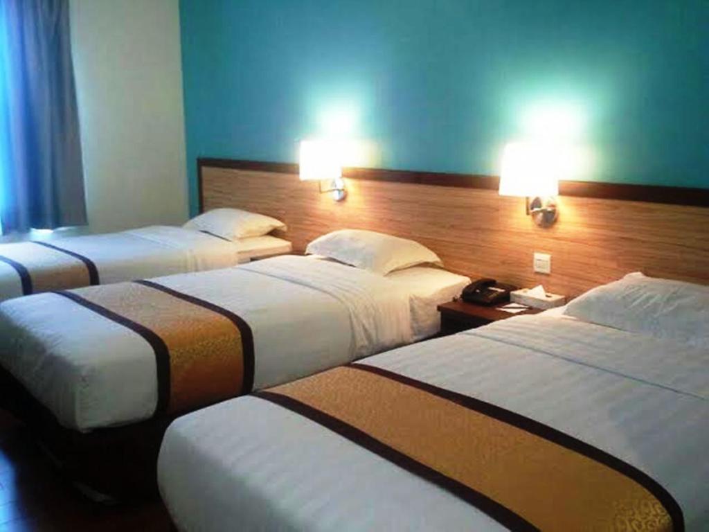 Трехместный (Трехместный номер Делюкс) отеля TD Lodge Kota Belud, Кота-Кинабалу