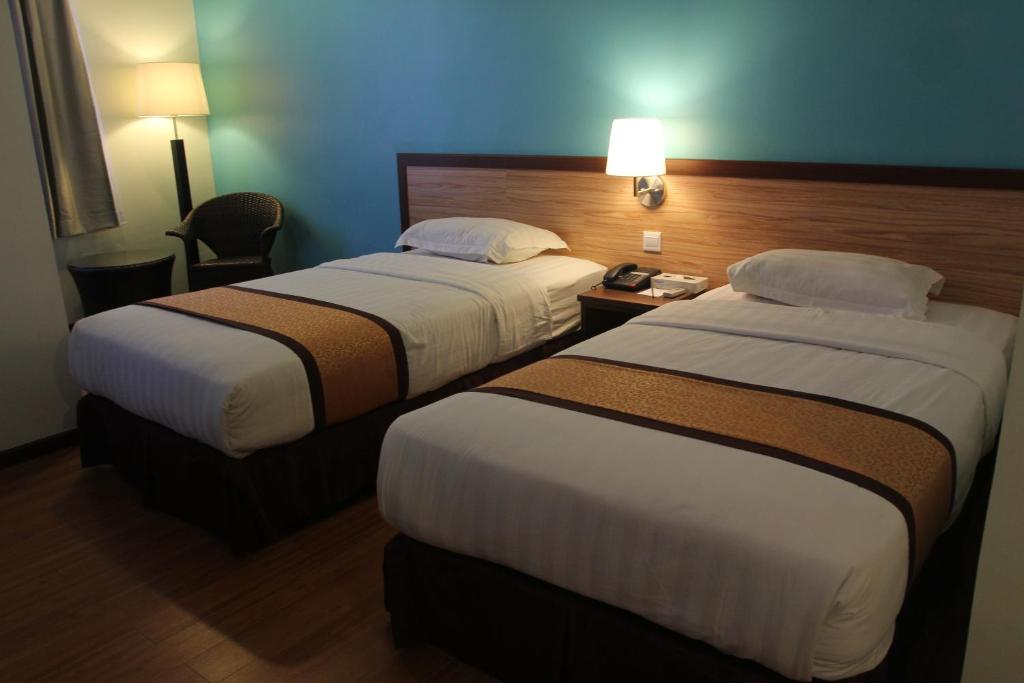 Двухместный (Двухместный номер Делюкс с 2 отдельными кроватями) отеля TD Lodge Kota Belud, Кота-Кинабалу
