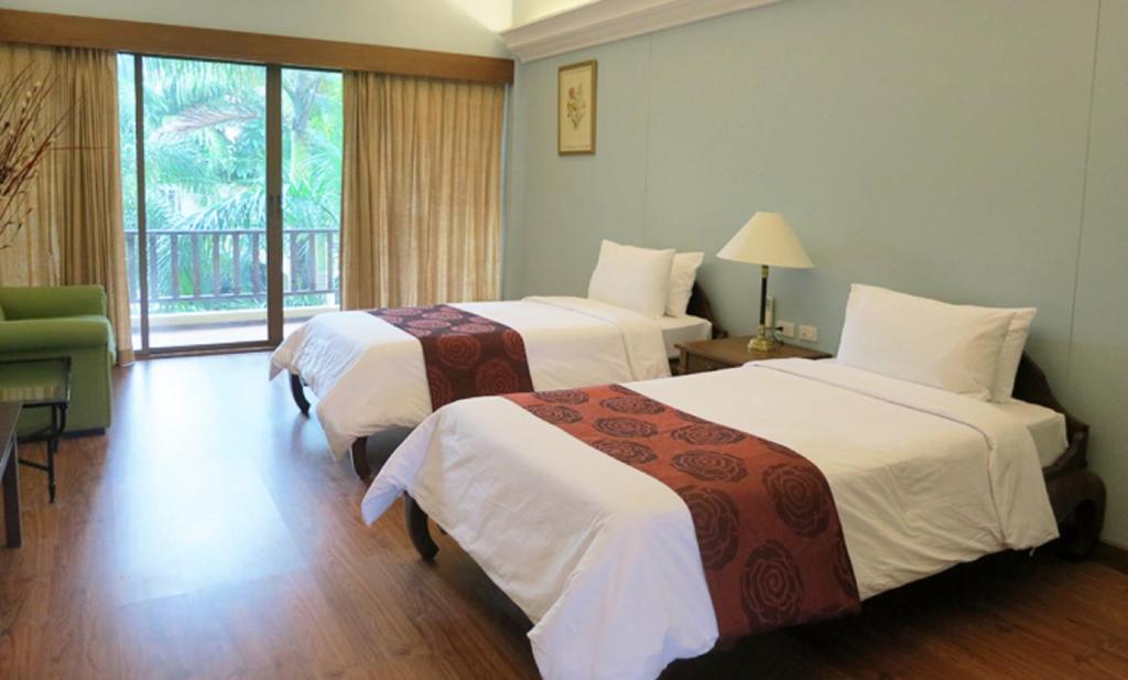 Двухместный (Двухместный номер Делюкс с 2 отдельными кроватями) отеля Mae Pim, Районг