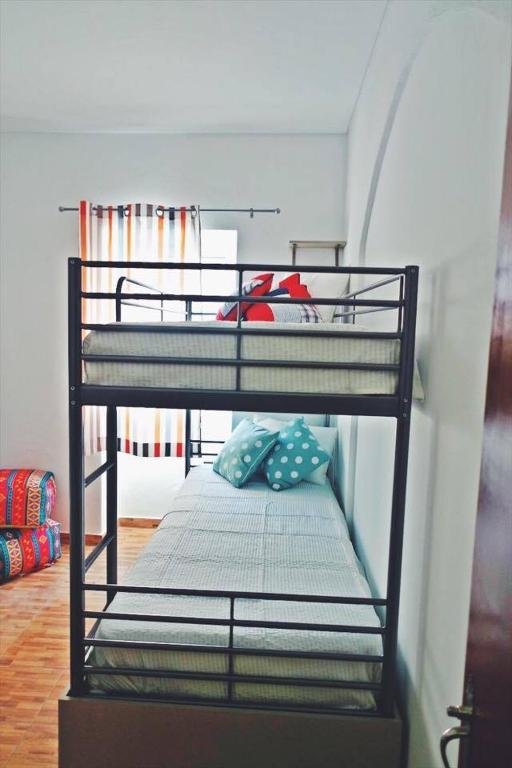 Номер (Спальное место на двухъярусной кровати в общем номере для мужчин и женщин) хостела Orange3, Лагуш