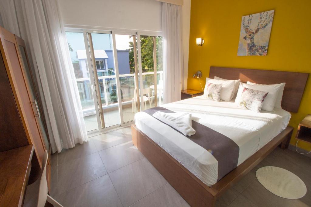 Двухместный (Номер с кроватью размера «queen-size» и видом на бассейн) гостевого дома Hotel Casa Valeria, Сосуа