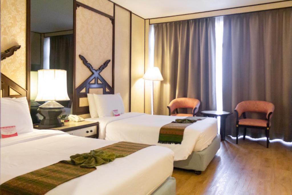 Двухместный (Представительский двухместный номер с 1 кроватью или 2 отдельными кроватями) отеля Chiang Mai Orchid, Чиангмай
